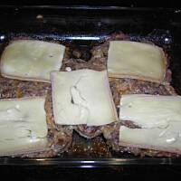 Kotlety schabowe zapiekane z pieczarkami i serem