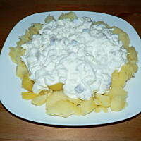 Śledzie w śmietanie z ziemniakami