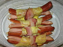 Fot. Sospiria, parówki zapiekane z boczkiem i serem