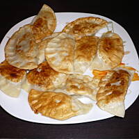 Pierogi z kapustą i pieczarkami