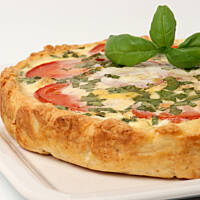 Quiche with tomatoes and basil