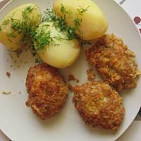 czosnkowe kotleciki z pangi w panierce z sera