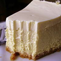 Sernik (cheesecake) z mango, i wiórkami kokosowymi