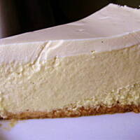 Sernik (cheesecake) z mango, i wiórkami kokosowymi