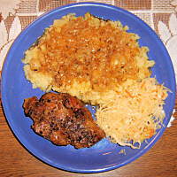 Pieczona karkówka w cebuli i jabłku wg M&Ł