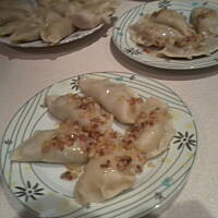 pierogi z kiszoną kapustą i pieczarkami