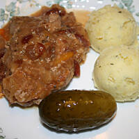 Wieprzowe medaliony w sosie żurawinowym