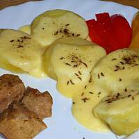 Raclette na ziemniakach z polędwicą