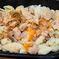 Indyk z pieczarkami i brzoskwinią