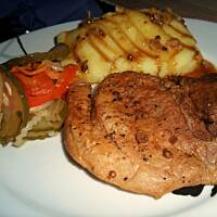 Schab pieczony w plastrach z kolendra