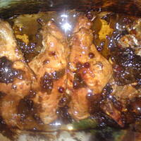 królicze udka pieczone z żurawiną i suszonymi śliwkami