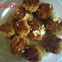 Pupleciki z kaszy i mięsa mielonego w sosie pomidorowym