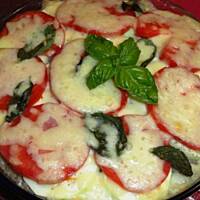 Zapiekanka z kaszy, mięsa, cukinii i pomidorów