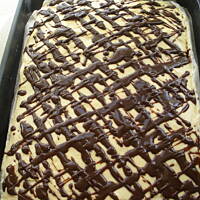 Sernik gotowany w czekoladowym biszkopcie