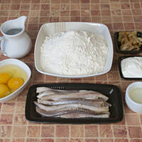 Paluchy śledziowe w cieście