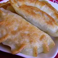 Pierogi z kapustą, grzybami i suszoną śliwką