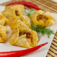 Paczuszki łososiowe z suszonymi pomidorami